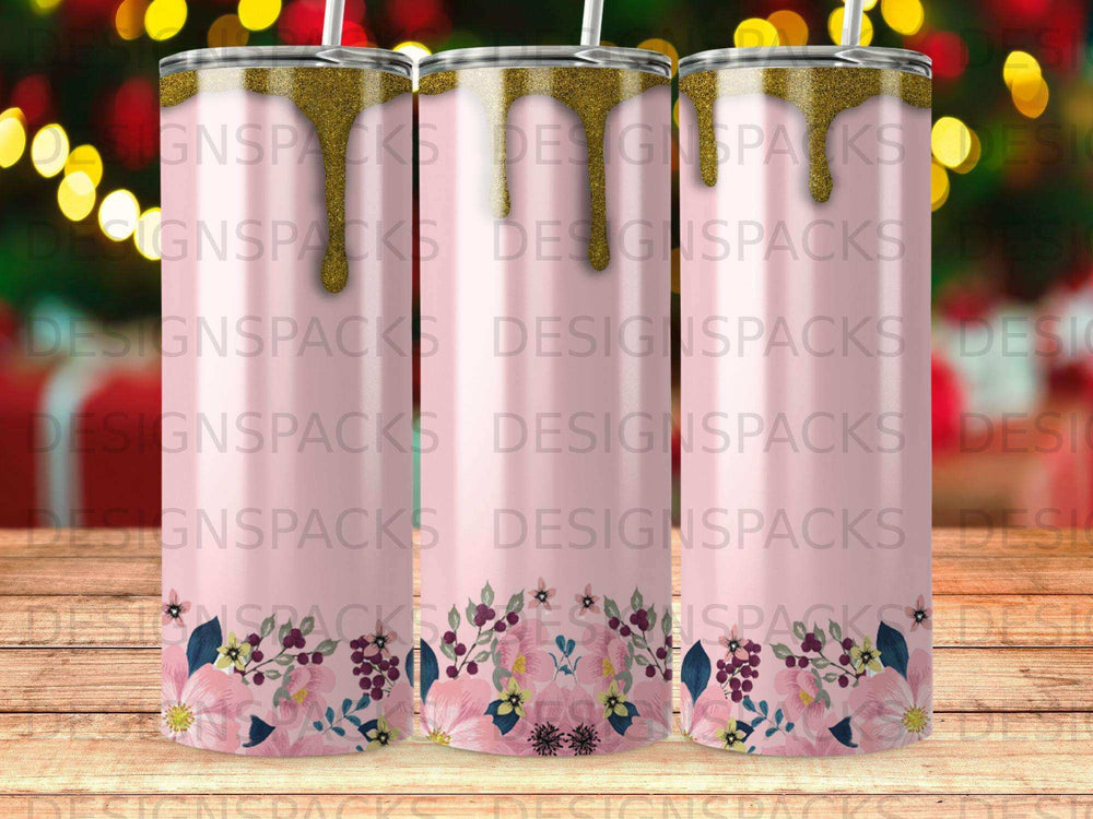 Pink tumbler with floral bottom and gold glitter top, with "DESIGNSPACKS" repeated.