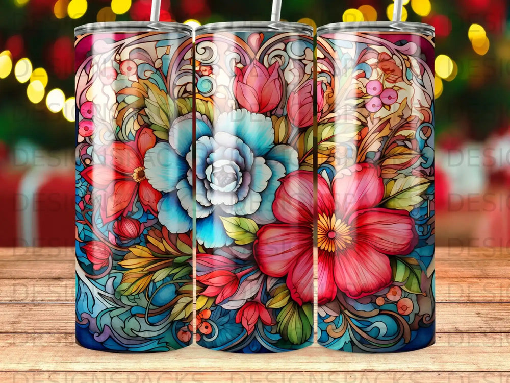 Floral tumbler with vibrant blue, red, and pink flowers and leaves.