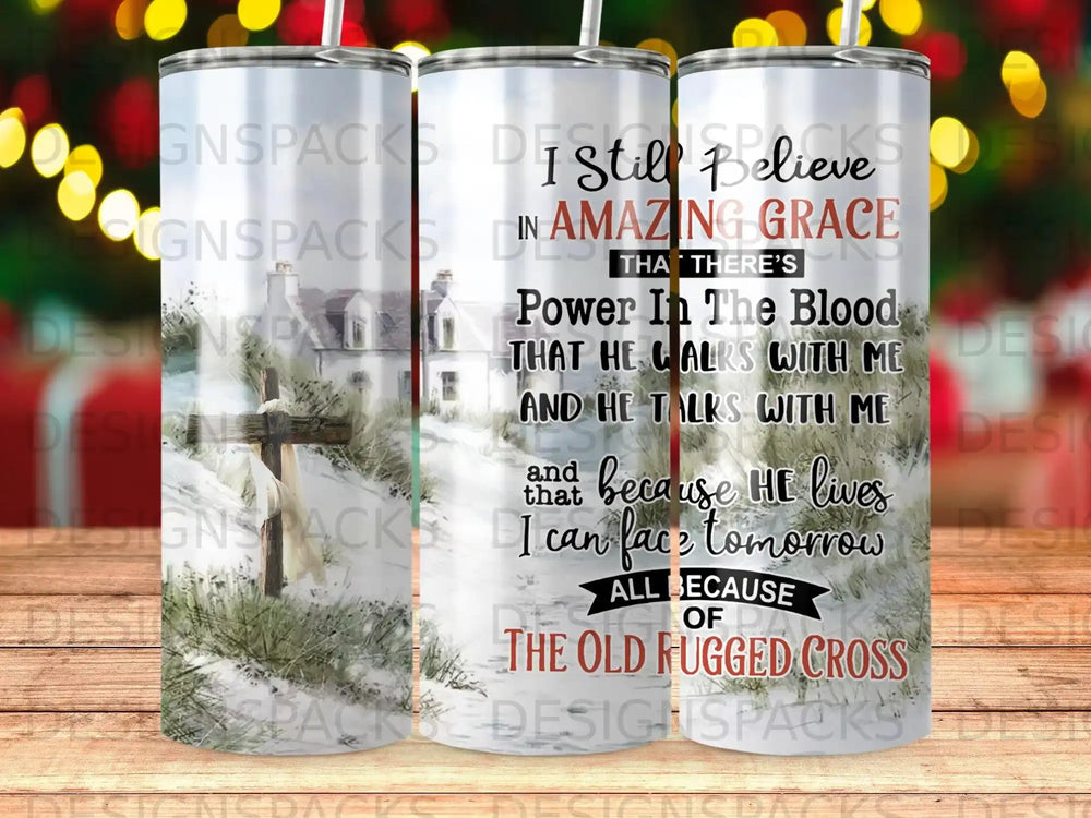 Religious tumbler with "I Still Believe In Amazing Grace" and "The Old Rugged Cross" text.