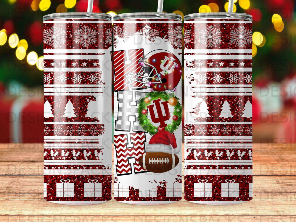 Christmas tumbler with "HO HO HO" text and football imagery.