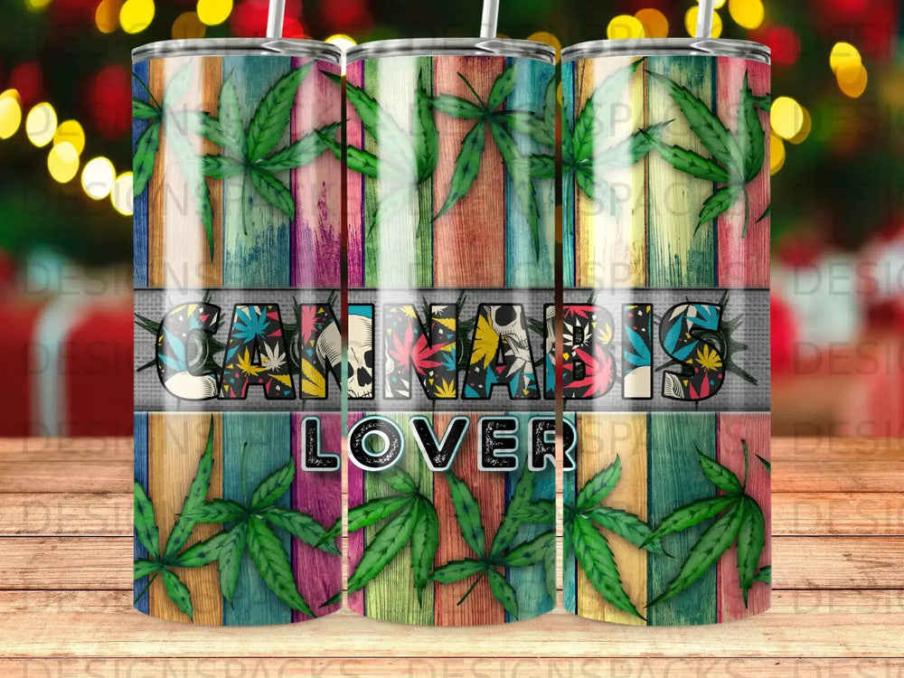 Cannabis Lover tumbler with colorful wood grain background and green cannabis leaves.