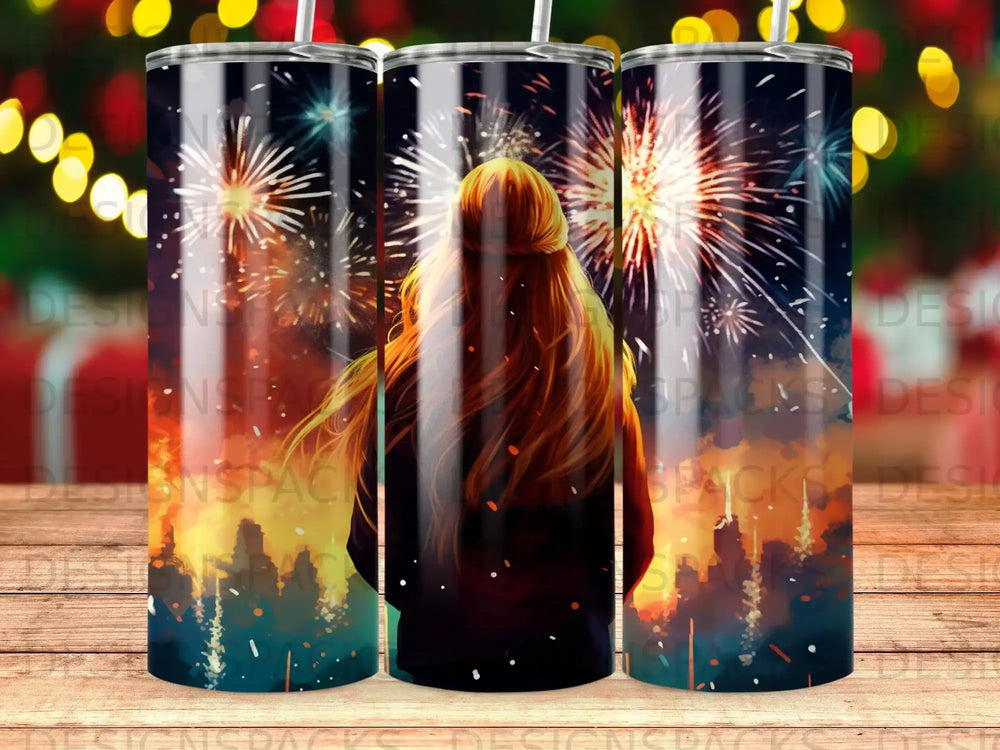 Woman with long hair watching fireworks over a city skyline.