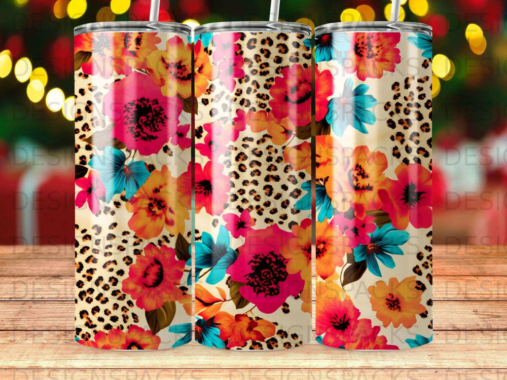 Three tumblers with floral and leopard print patterns.