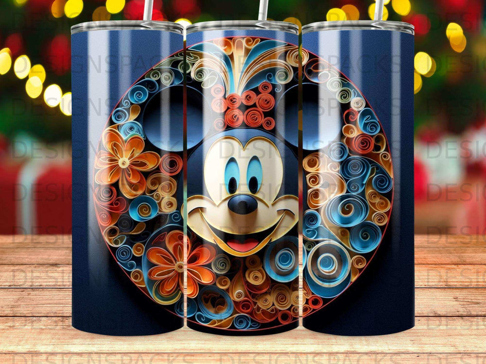 Mickey Mouse face with floral quilling design on a blue tumbler.