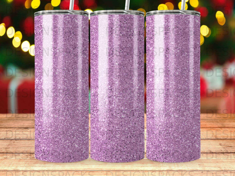 Three glittery purple tumblers with straws arranged side-by-side.