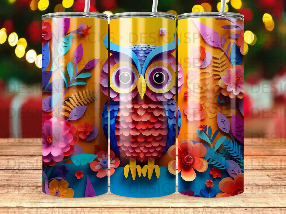 Owl design on a yellow tumbler with floral accents.