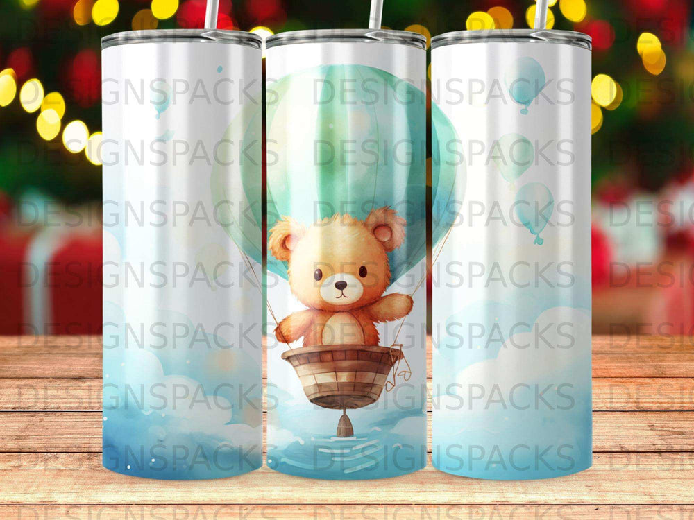 Teddy bear in a hot air balloon with clouds and "DESIGNSPACKS" text.