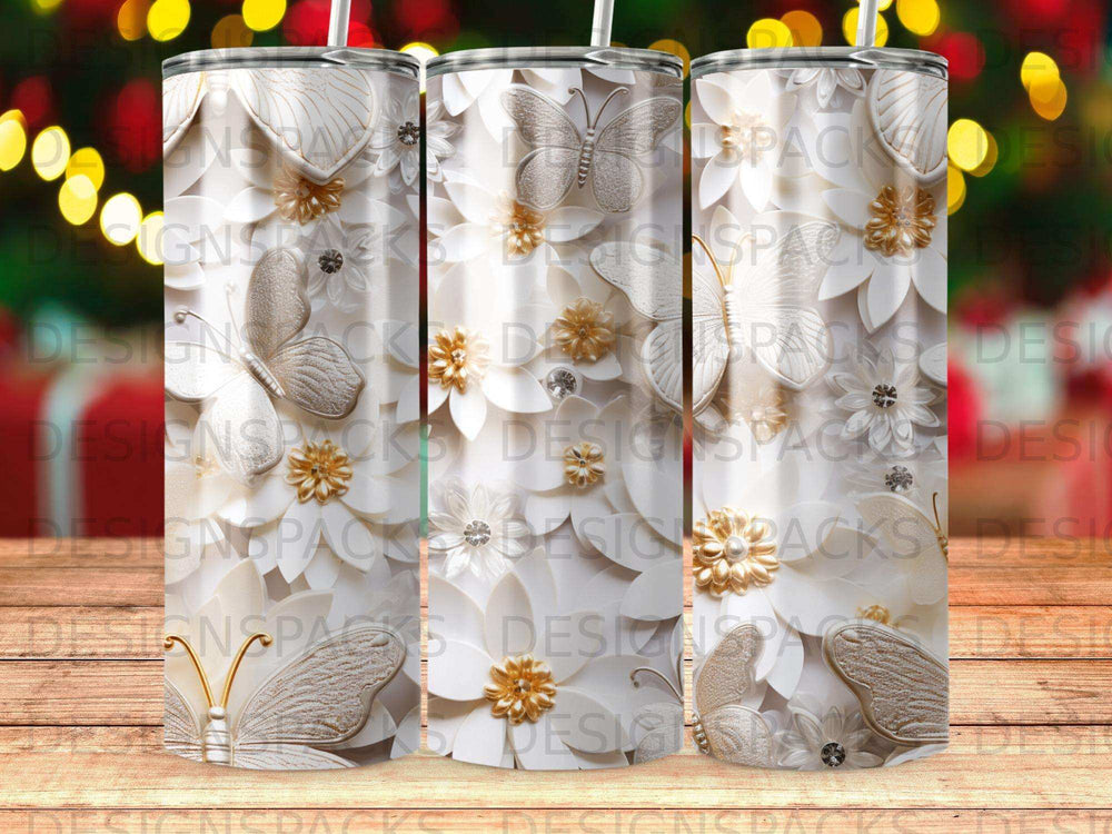 White butterfly and floral embossed tumbler with golden accents.