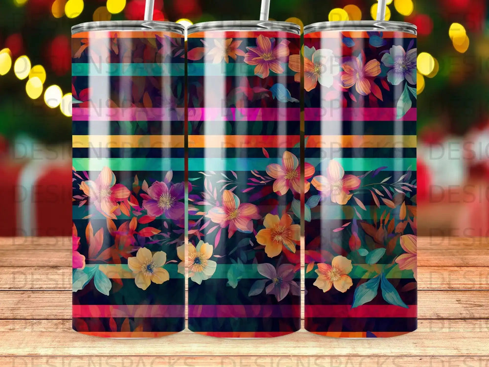 Tumbler with floral pattern and colorful stripes.