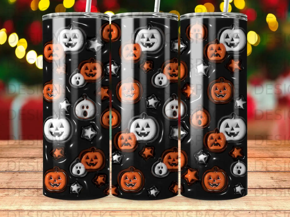 Tumbler with Halloween pumpkins, ghosts, and stars pattern on black background.