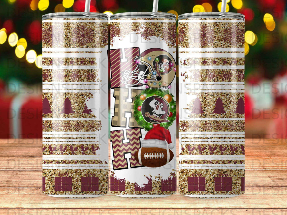 Holiday tumbler with "HO HO HO" text, football helmet, and festive glitter and plaid patterns.