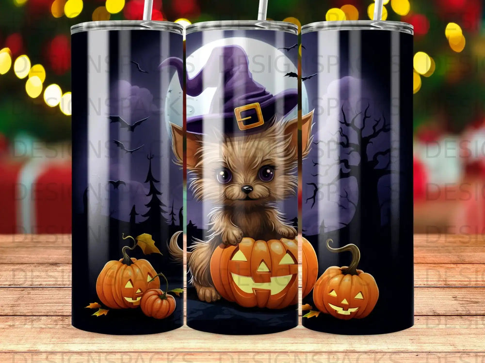 Yorkshire terrier in witch hat sitting on pumpkin with spooky background.