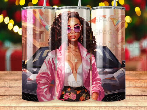 Woman in pink jacket and sunglasses poses with a car.
