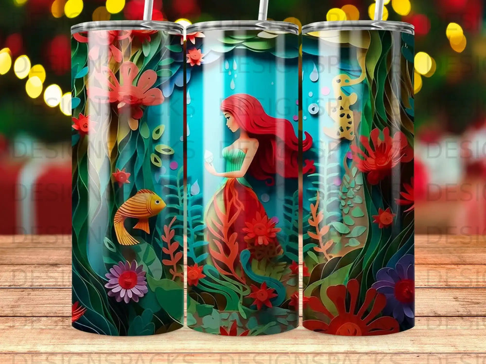 Mermaid with red hair, fish, and colorful underwater plants on a tumbler.