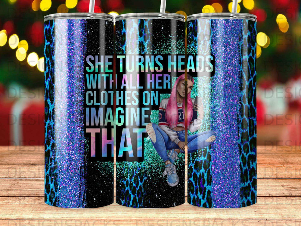 Tumbler with leopard print and glitter, featuring text "SHE TURNS HEADS WITH ALL HER CLOTHES ON IMAGINE THAT".