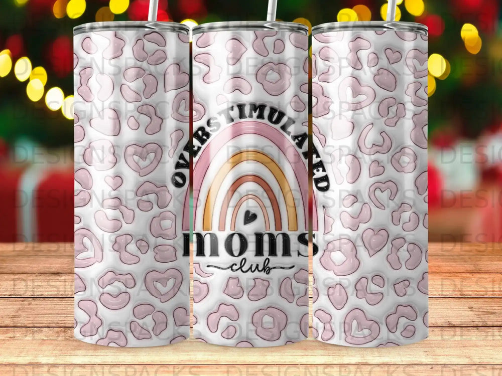 Pink leopard print tumbler with "OVERSTIMULATED MOMS CLUB" and rainbow heart.