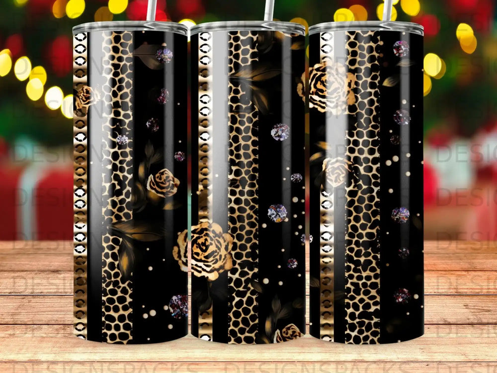 Three tumblers with leopard print, rose, and jewel patterns.