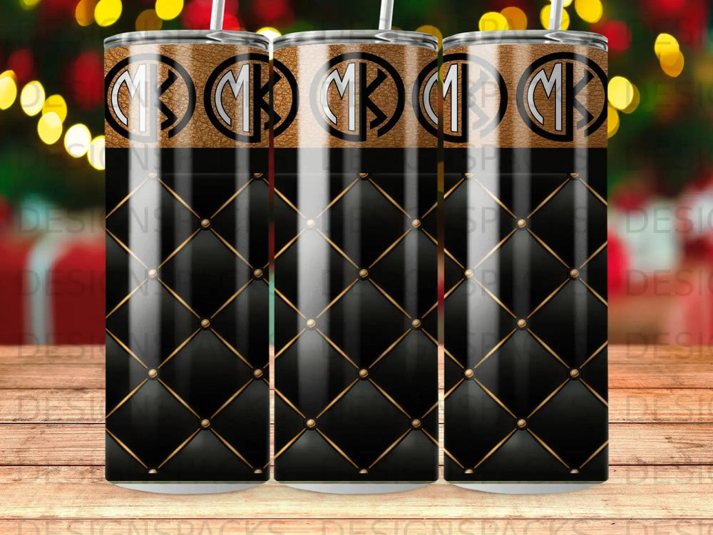 Black and gold diamond pattern tumbler with repeating monogram letters.