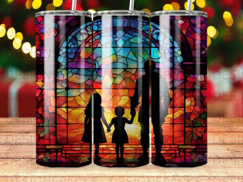 Silhouetted family holding hands against a stained glass sunset.