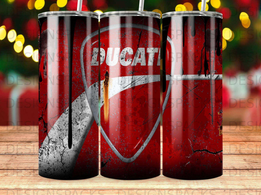 Ducati shield logo on a distressed red tumbler with splattered paint.