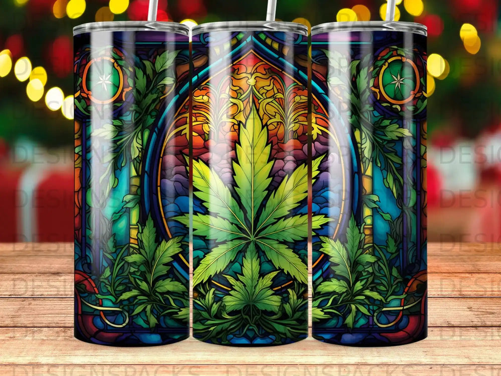 Stained glass tumbler featuring a cannabis leaf and ornate floral patterns.