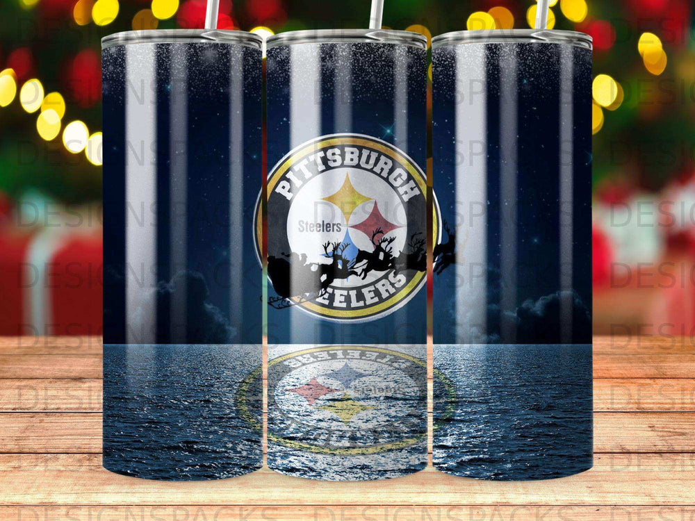 Pittsburgh Steelers tumbler with Santa's sleigh and Christmas lights reflected in water.