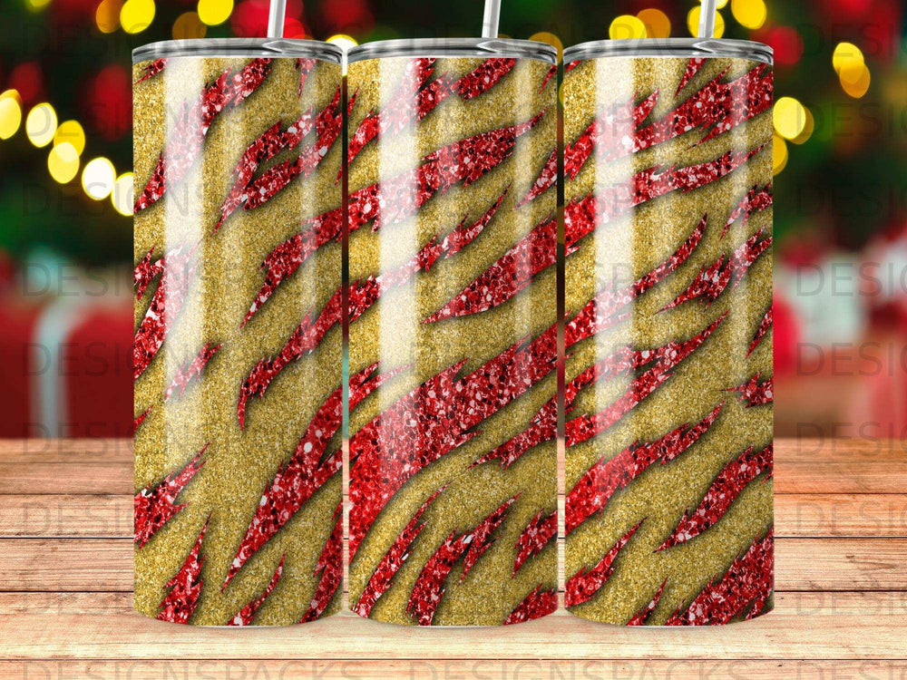 Gold glitter tumbler with red tiger stripes.