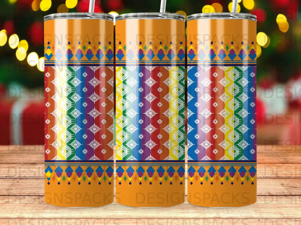 Three tumblers with colorful geometric patterns and orange bases.