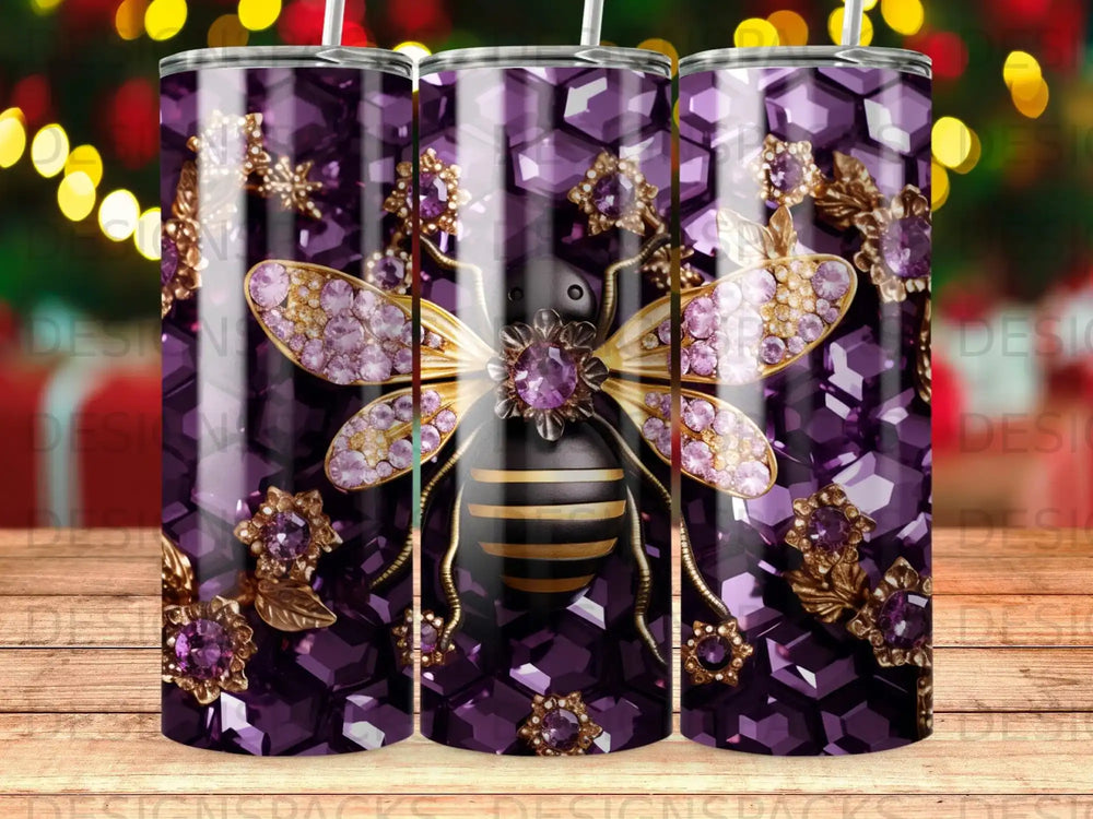 Tumbler with purple jewel and bee design.