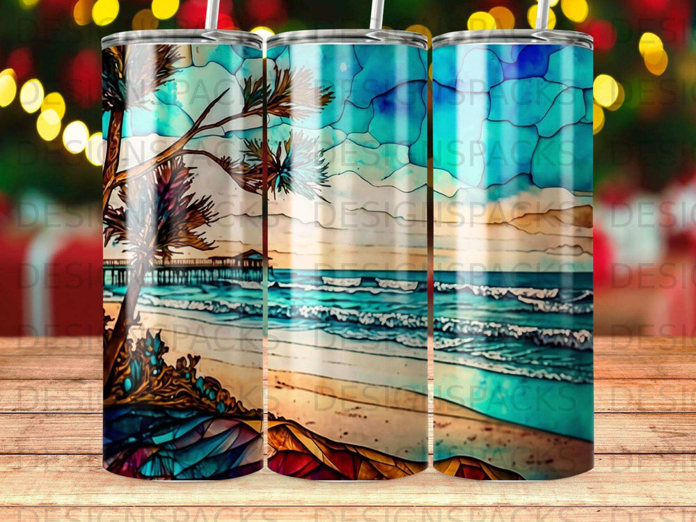 Three tumblers with beach scene, ocean, pier, and palm tree.