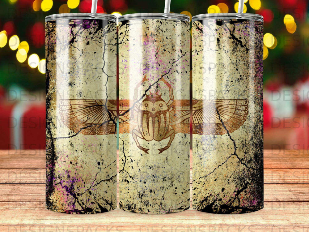 Tumbler with Egyptian scarab beetle design on distressed, textured background.