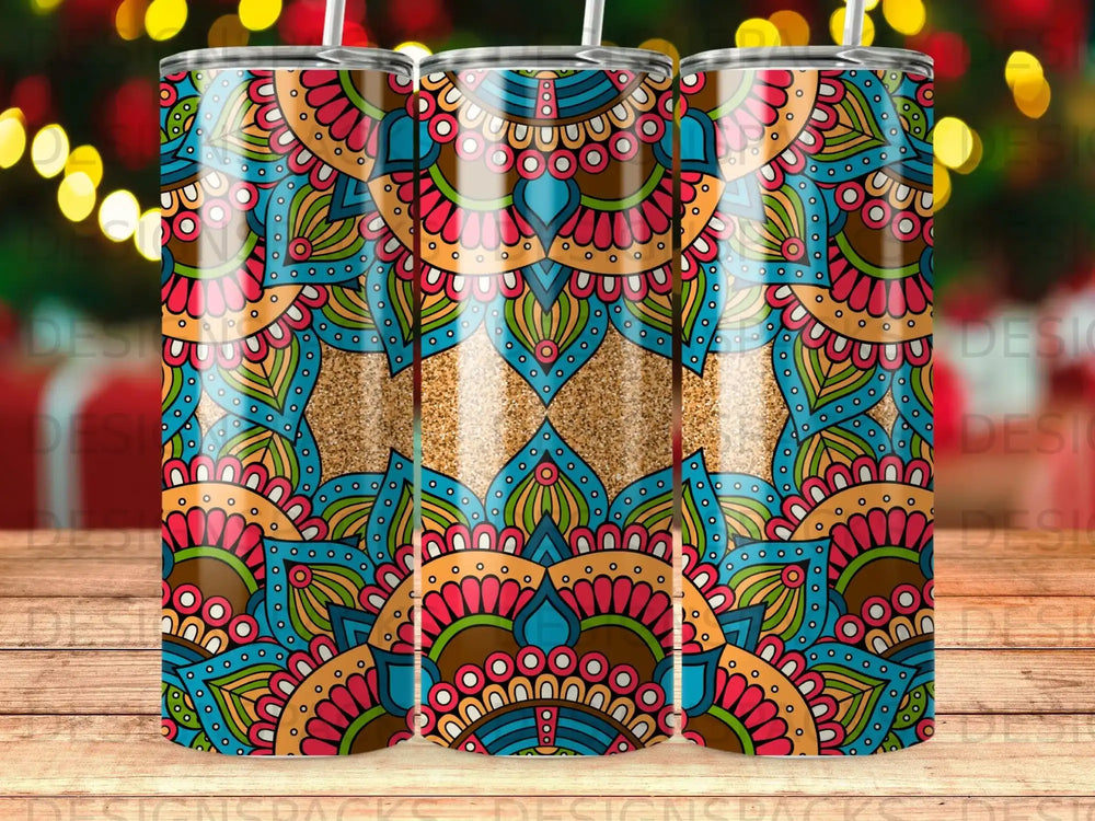 Three tumblers with a colorful mandala pattern and glitter accents.