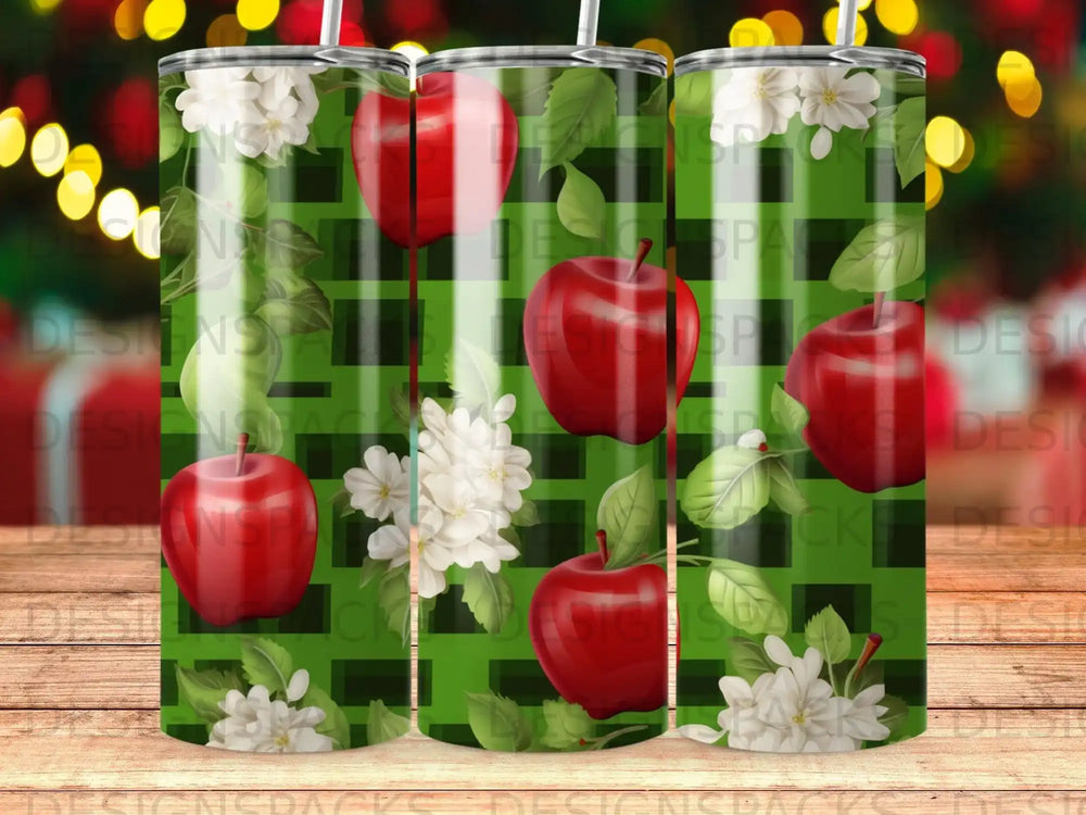 Green plaid tumbler with apples and white flowers design.