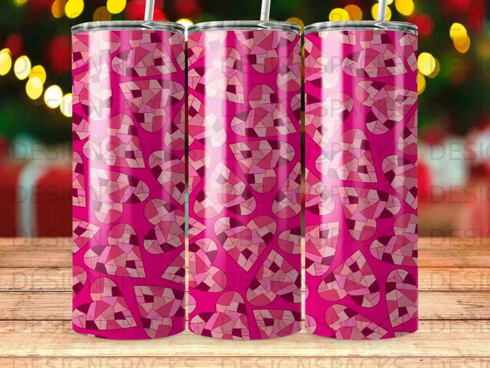 Pink and red geometric heart pattern on a tumbler.