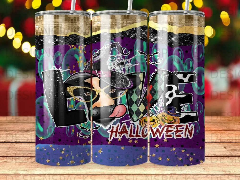 Halloween tumbler with "LOVE" made of cow print and spooky graphics.
