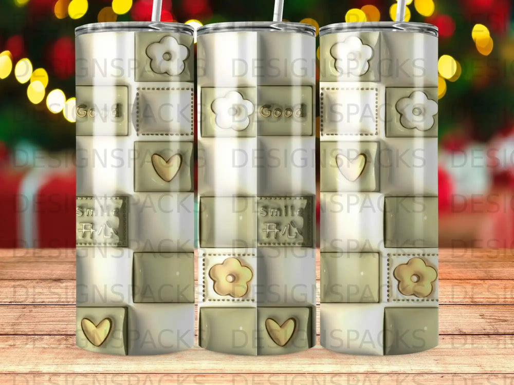 Three tumblers with a repeating pattern of hearts, flowers, and "Good" text.