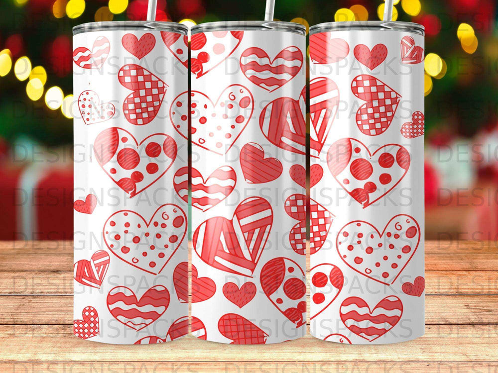 White tumbler with red hearts pattern and bokeh lights background.