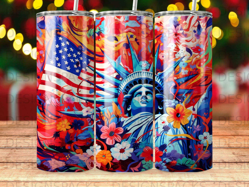 Statue of Liberty and American flag with floral accents on a colorful tumbler.