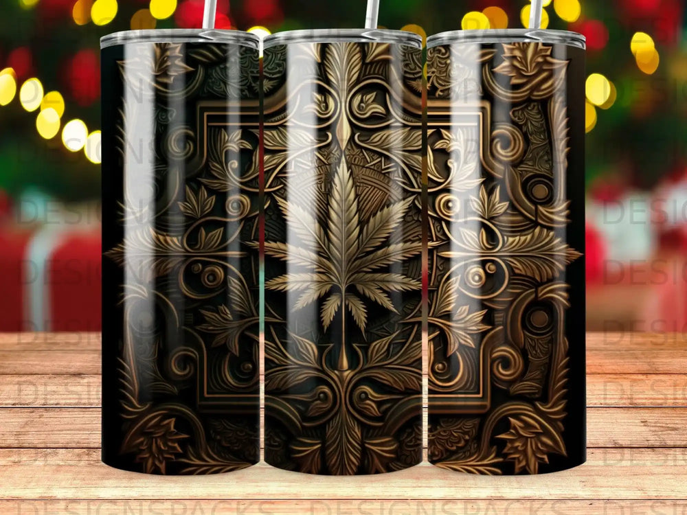 Black and gold cannabis leaf tumbler with ornate scrollwork pattern.