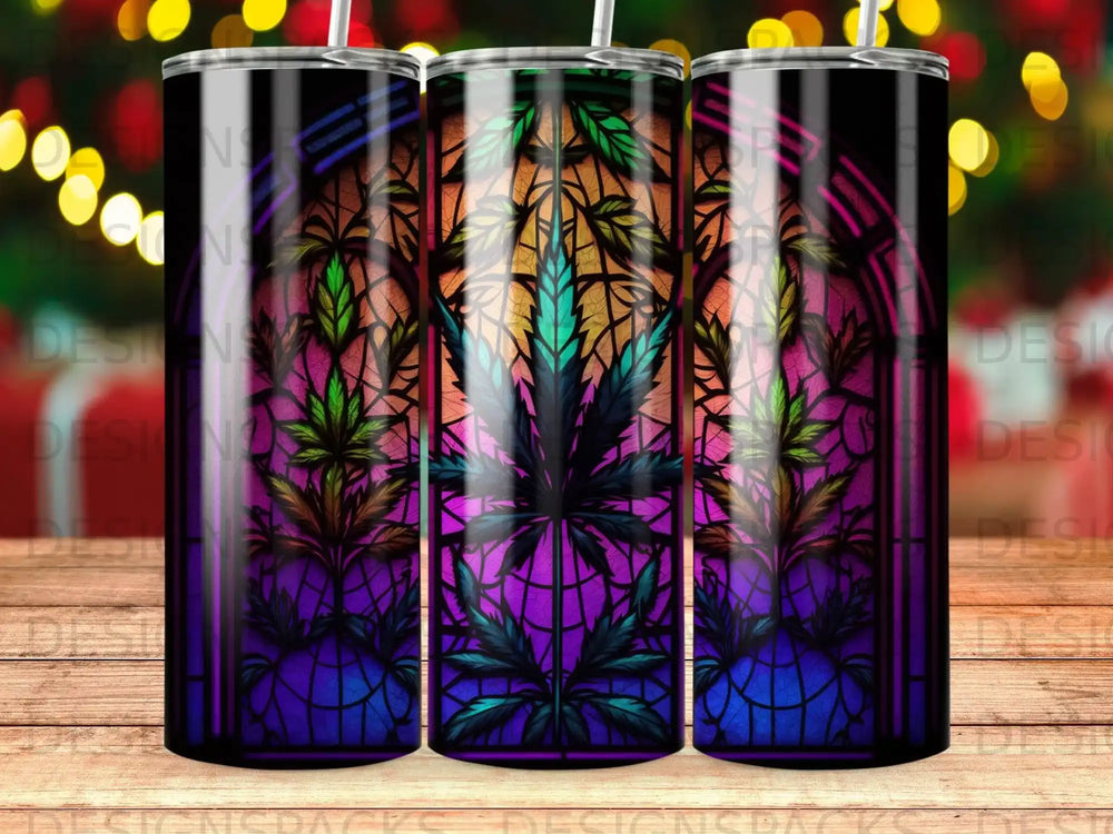 Stained glass cannabis leaf design on a purple and green tumbler.