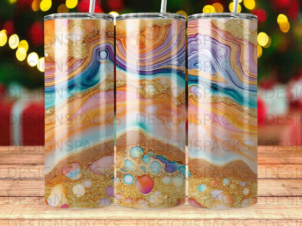 Tapered tumbler with colorful marble and glitter abstract design.