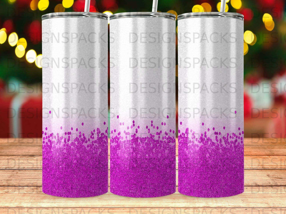 Two glitter-covered tumblers with "DESIGNSPACKS" text.