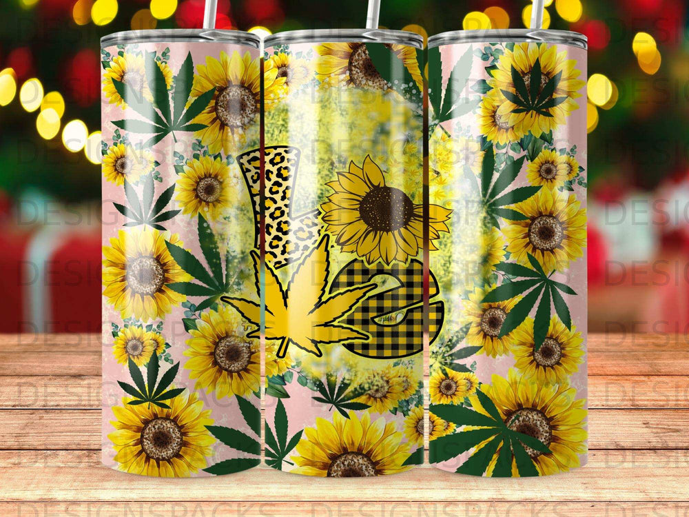 Sunflower and cannabis leaf pattern tumbler with plaid accents.