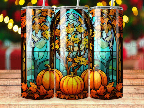 Stained glass tumbler featuring pumpkins and autumn leaves.