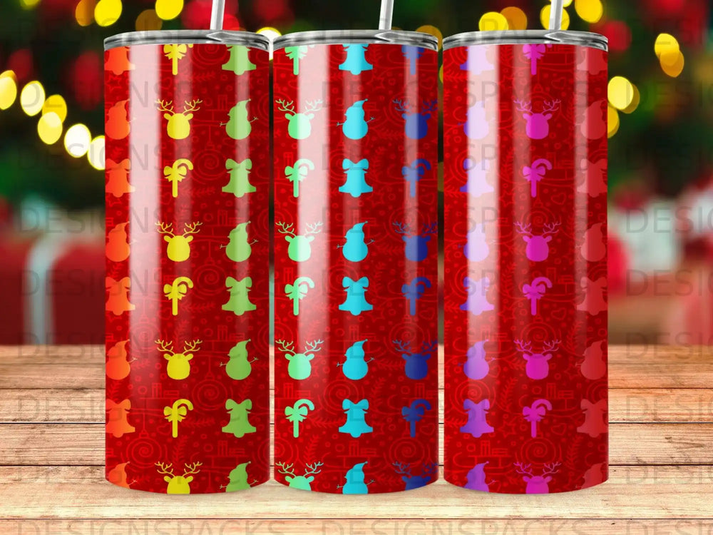 Red tumbler with colorful Christmas icons including reindeer, candy canes, and snowflakes.