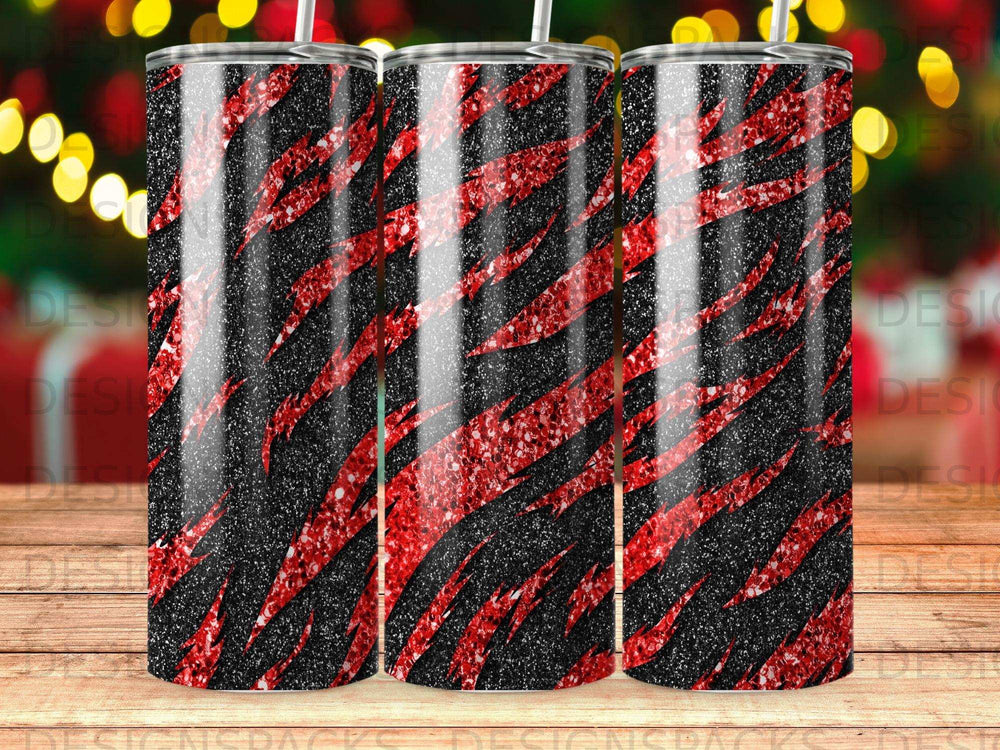 Black and red glitter stripe tumbler with black speckles.