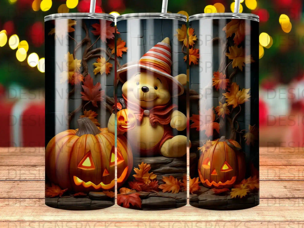 Winnie the Pooh in Halloween costume with pumpkins and autumn leaves.