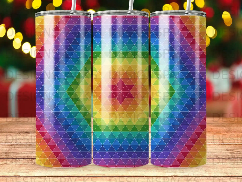 Rainbow geometric pattern on a cylindrical tumbler with straw.