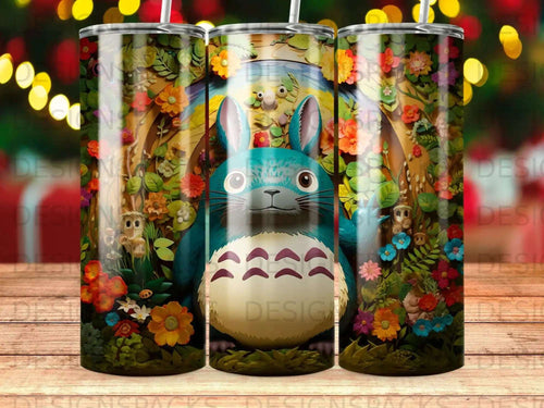 Totoro surrounded by colorful flowers and foliage in a whimsical forest.
