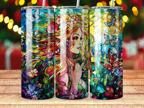 Colorful stained glass design of a woman with flowing hair surrounded by butterflies and flowers.